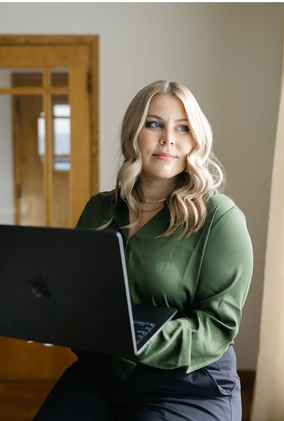 Shelby Pavlovic reviewing Medicine Hat market data